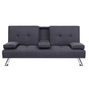 Andratx dark grey fabric 3 seater sofa bed in a contemporary living room