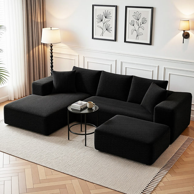 Tavernes black corduroy modular sofa in a modern living room
