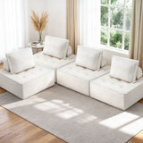 Motril white boucle fabric floor sofa in a modern living room