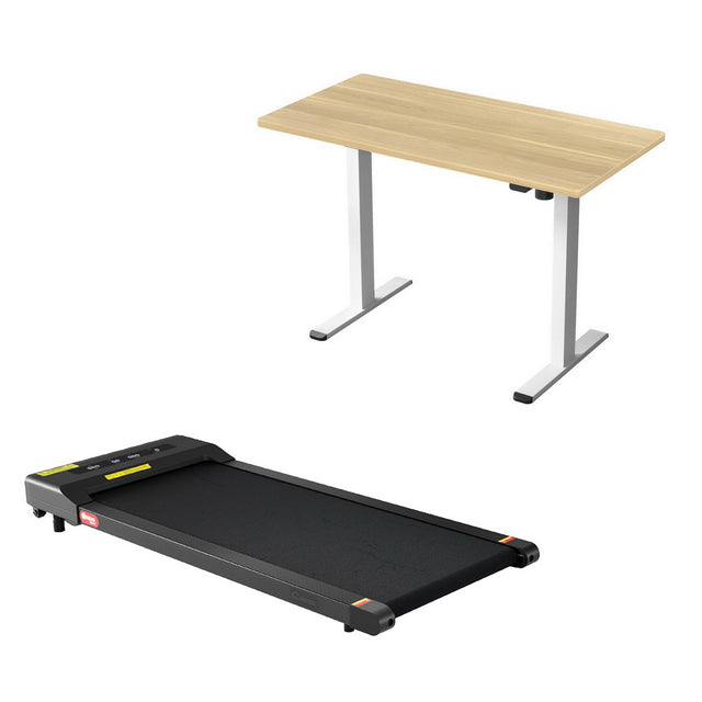 Kingston oak electric standing desk with walking pad in a home office