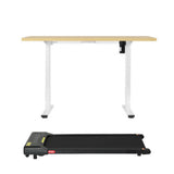 Kingston oak electric standing desk with walking pad in a home office