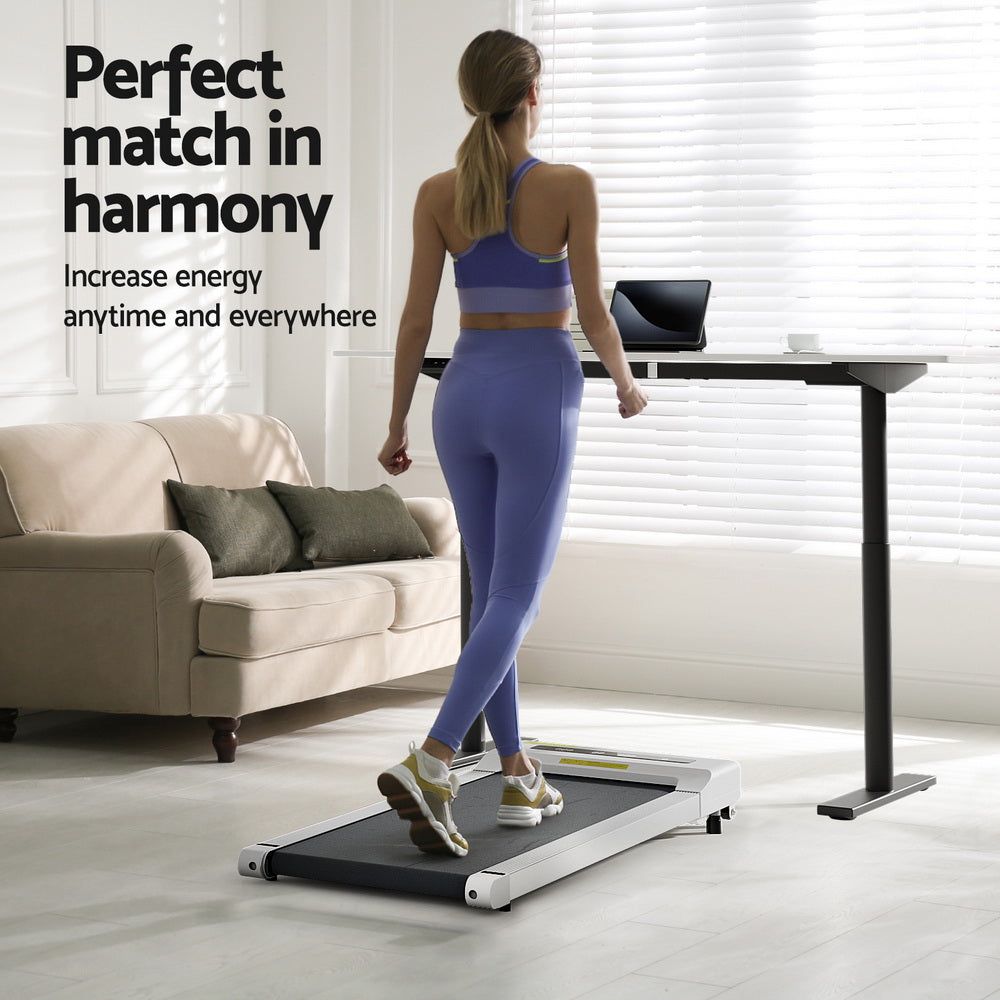 Red Hill white standing desk with walking pad in a home office