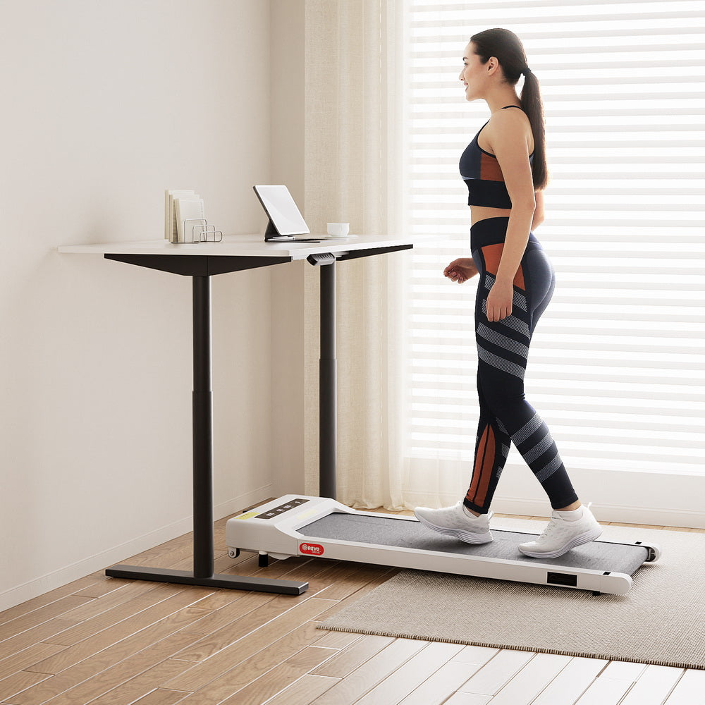 Red Hill white standing desk with walking pad in a home office