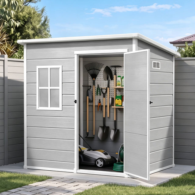 Outdoor garden storage shed in grey resin, front view
