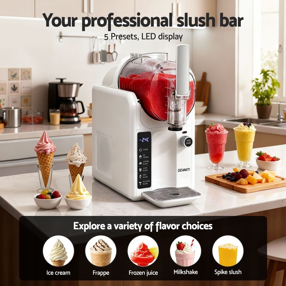 Fruit slush served in a glass beside the white slushie machine
