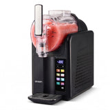 Slushie machine dispensing a frozen drink into a glass