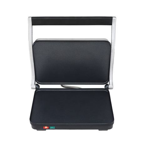 Sandwich press opened flat as a double sided grill plate