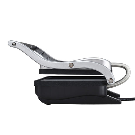Two toasted sandwiches cooking on the 1000 W sandwich press