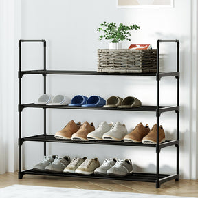 Greer black four tier stackable shoe rack holding 16 pairs in an entryway