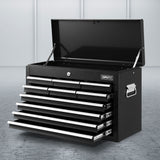 Black 10 drawer steel tool chest with open drawers in a garage workshop