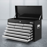 Grey 10 drawer steel tool chest with open drawers in a garage workshop