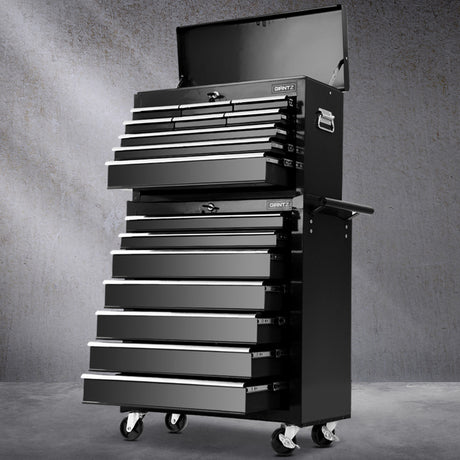 Black 16 drawer steel tool chest with open drawers in a garage workshop