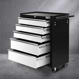 Grey 5 drawer steel tool trolley on castors in a garage workshop
