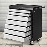 Grey 7 drawer steel tool trolley on castors in a garage workshop