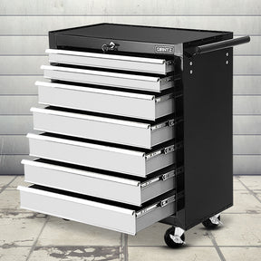 Grey 7 drawer steel tool trolley on castors in a garage workshop