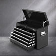Black 9 drawer steel tool chest with open drawers in a garage workshop