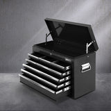 Black 9 drawer steel tool chest with open drawers in a garage workshop