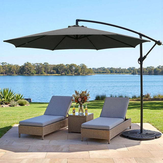 Black cantilever outdoor umbrella shading a patio