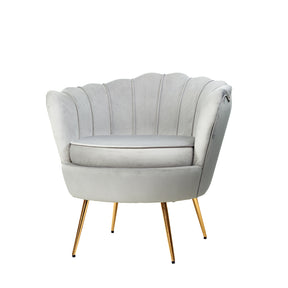 Mount Banks grey velvet armchair with vintage scallop shell back in a living room