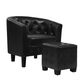 Mount Boyce black PU leather tub armchair and ottoman set in a living room