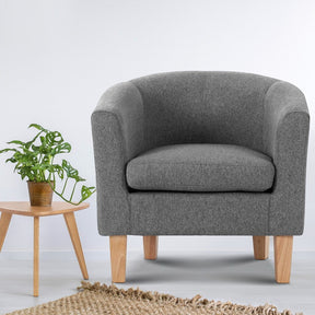 Warrimoo grey linen tub chair in a modern living room