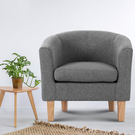 Warrimoo grey linen tub chair in a modern living room