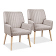 Faulconbridge beige faux fabric armchair in a modern living room