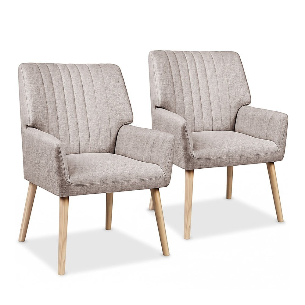 Faulconbridge beige faux fabric armchair in a modern living room