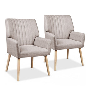 Faulconbridge beige faux fabric armchair in a modern living room