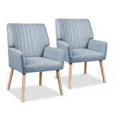Faulconbridge blue grey faux fabric armchair in a modern living room