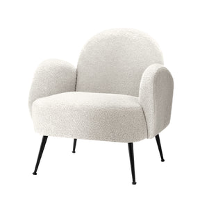 Hampton white sherpa boucle armchair with solid wood legs in a living room