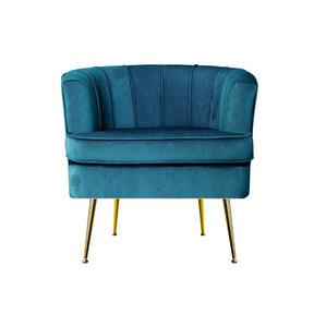 Mount Irvine blue velvet armchair with solid wood construction in a living room