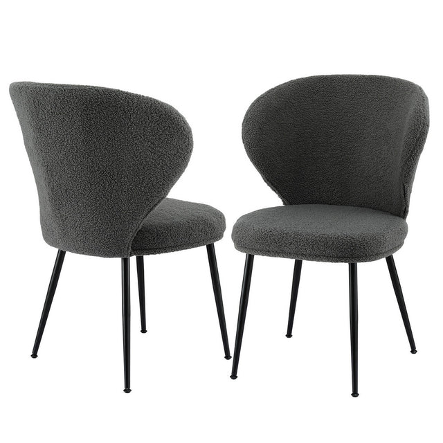 Aldgate grey sherpa wing back dining chairs with steel legs in a contemporary dining room