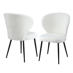 Kingscote white sherpa wing back dining chairs, set of two, with steel legs in a dining room