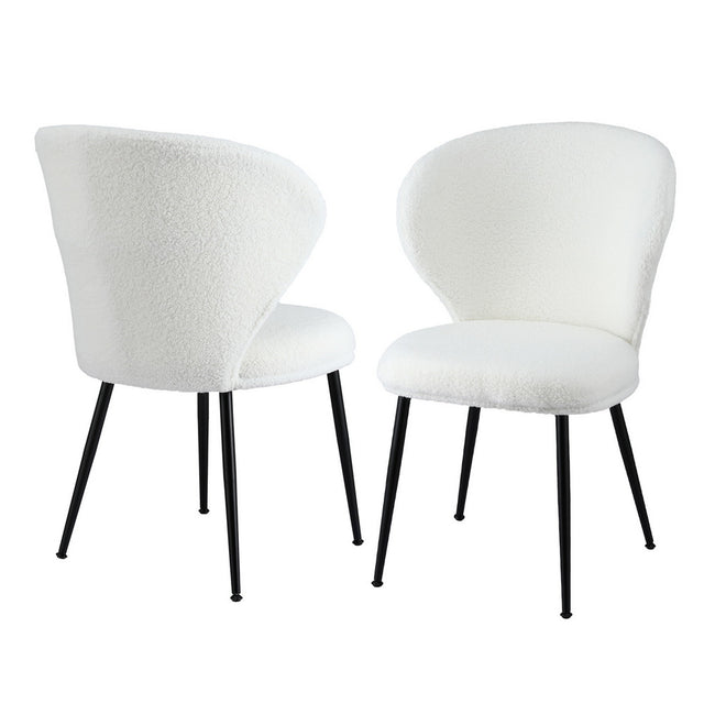 Kingscote white sherpa wing back dining chairs, set of two, with steel legs in a dining room