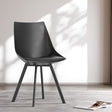 Frankston black upholstered dining chair in a modern Australian kitchen