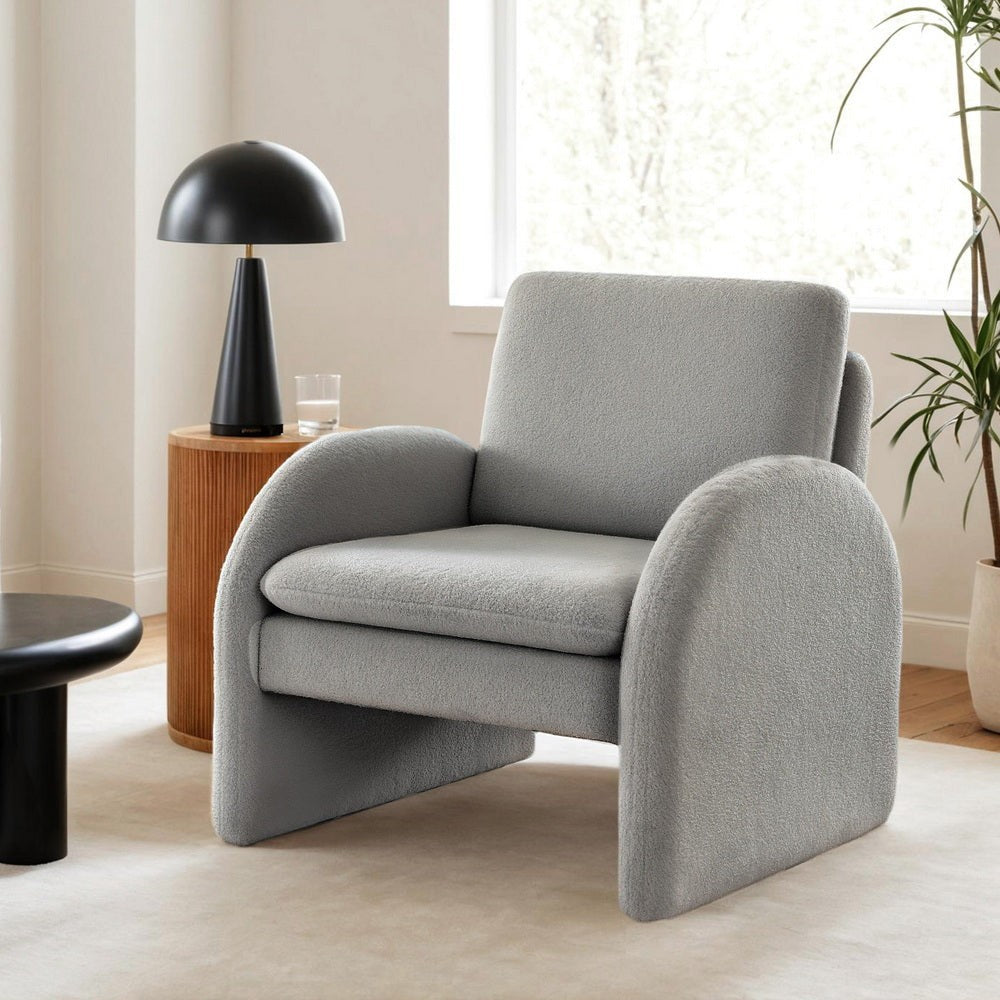 Hazelbrook grey boucle accent chair in a modern living room