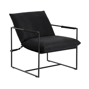 Woodford black sling accent armchair with open metal frame in a modern room