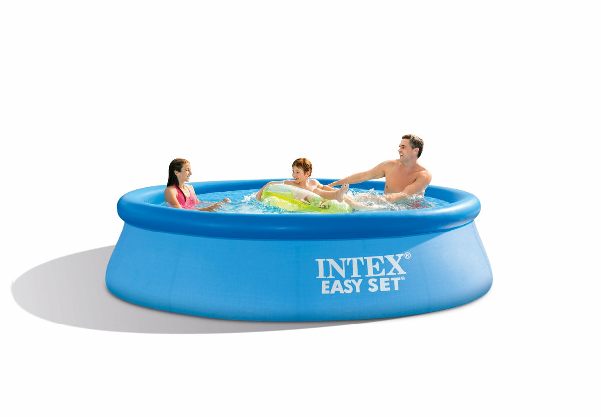 Round easy set inflatable swimming pool with filter pump in a backyard