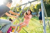 Children playing on the two feature swing set