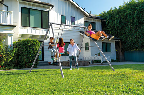 Swing set in a backyard setting