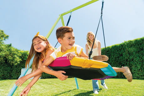 Three feature saucer and chain swing set outdoors