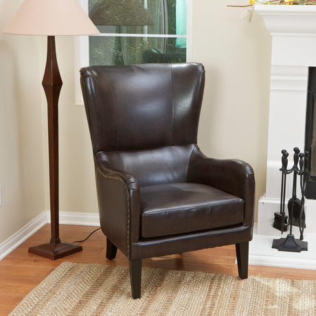 Evans brown bonded leather armchair in a modern living room