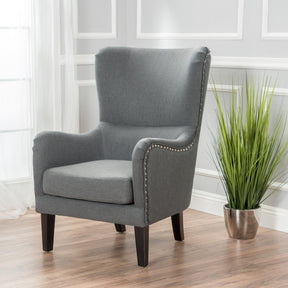 Evans grey fabric armchair in a modern living room