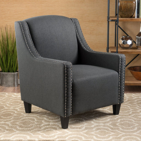 Jamison dark grey linen armchair in a modern living room