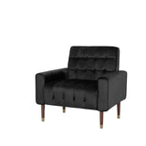 Cahills black velvet accent chair in a modern living room