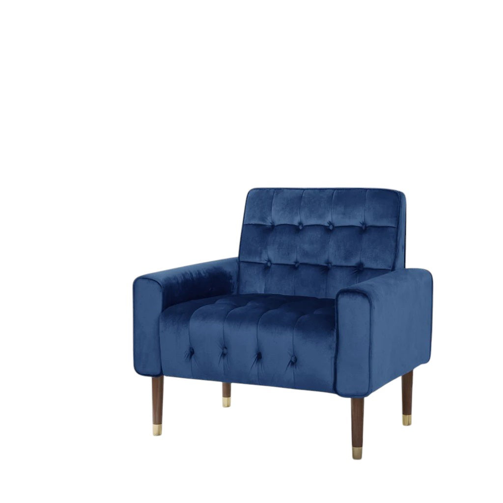 Cahills navy blue velvet accent chair in a modern living room