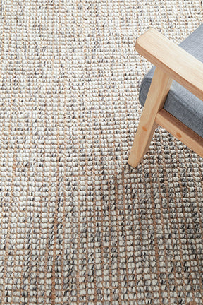 Ardabil grey hand loomed wool and jute area rug in a Scandinavian living room