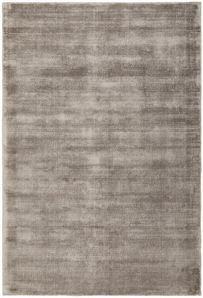 Khiva grey hand loomed viscose area rug with soft sheen in a coastal lounge