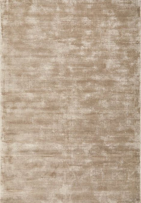 Khiva silver hand loomed viscose area rug with soft sheen in a coastal lounge